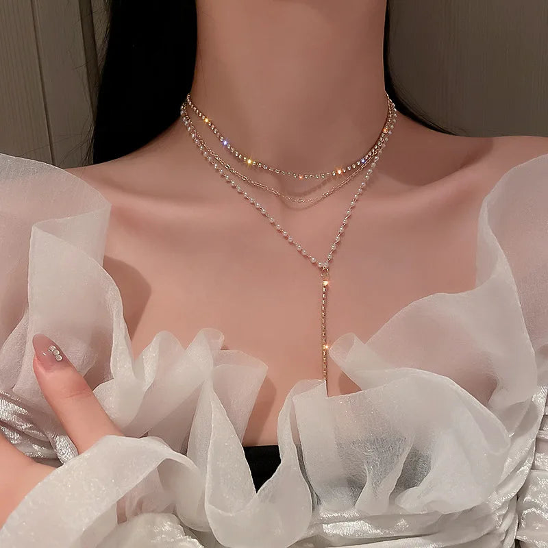 Aureline Parel Choker – Verstelbare Champagnekleurige Ketting met Parelaccenten