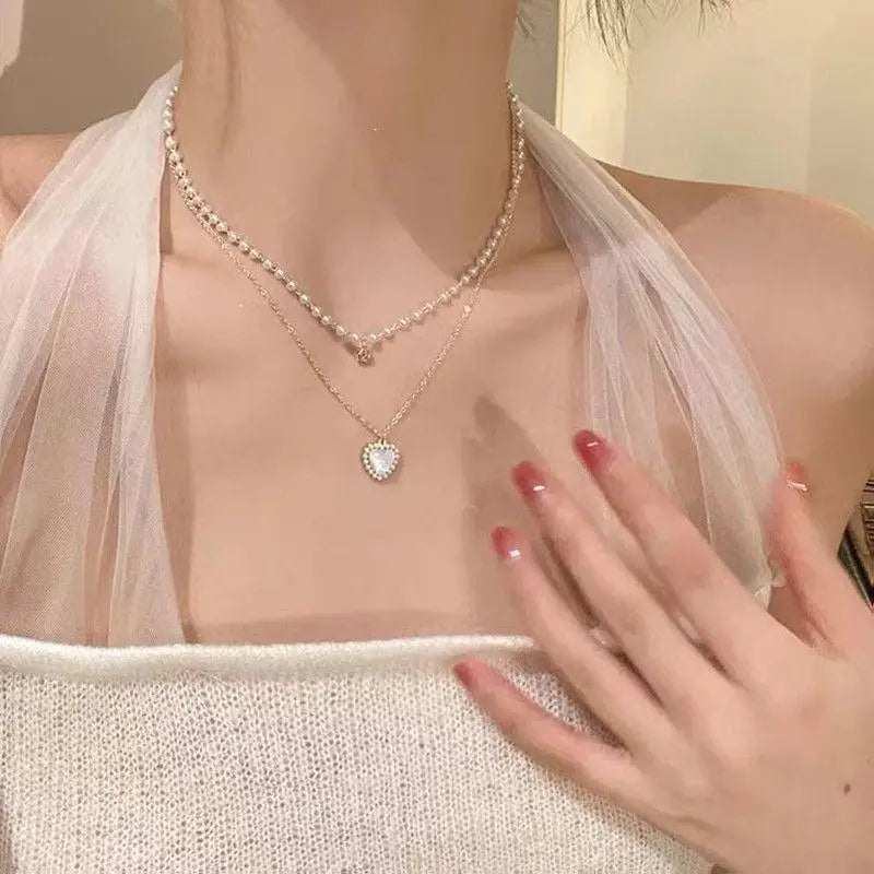 Aureline Parel Choker – Verstelbare Champagnekleurige Ketting met Parelaccenten