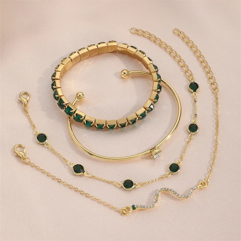 Serpentina Luxe Armbanden Set – 4-Delige Slangenmotief Armbanden met Groene Edelstenen & Rhinestones